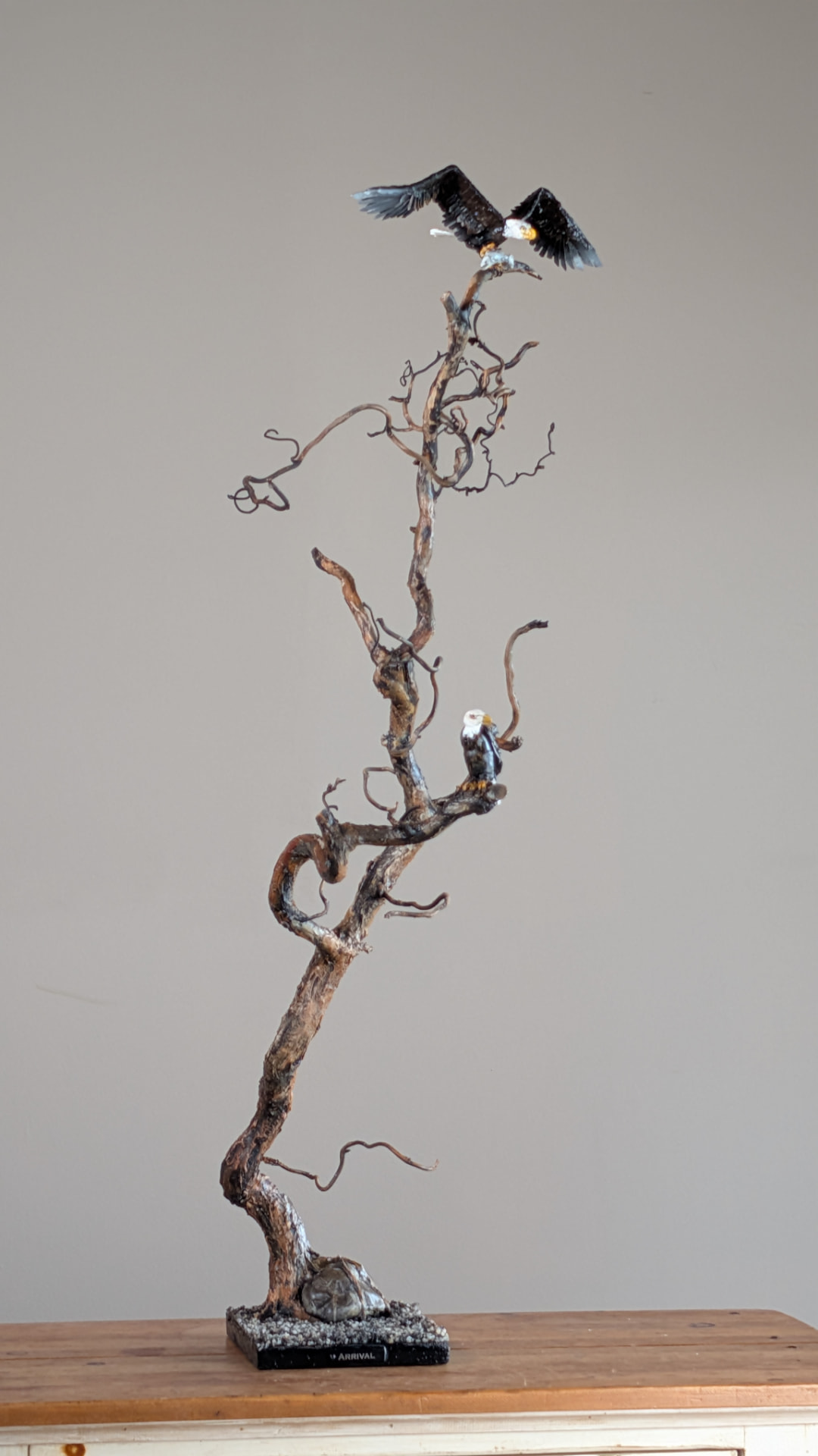 Arrival — mixed media eagle sculpture on reclaimed wood, 40½″ tall